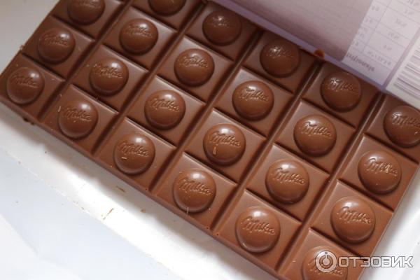 Шоколад Milka Toffee Wholenut с целыми лесными орехами, молочной и карамельной начинкой фото