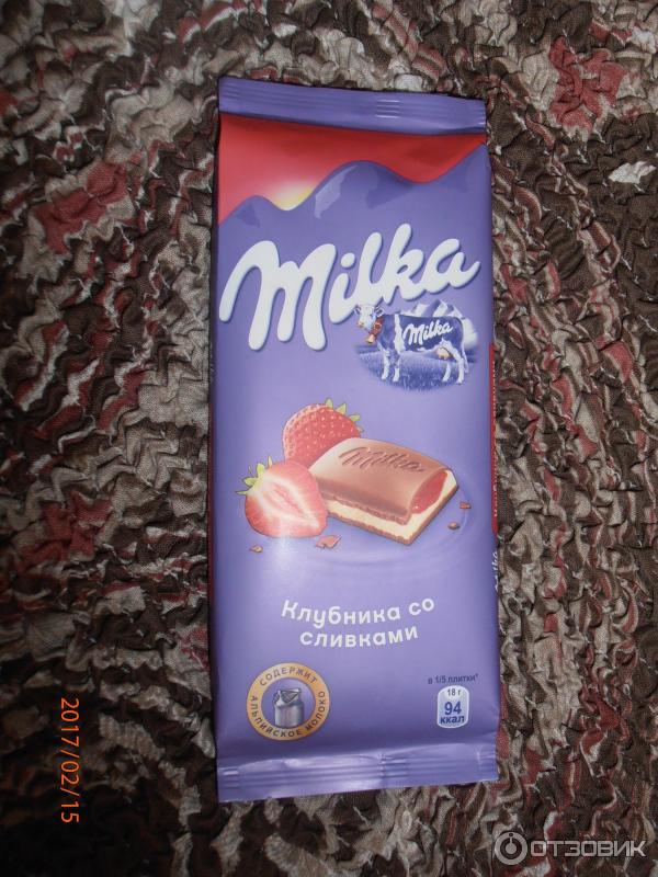 Шоколад молочный Milka с двухслойной начинкой фото