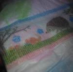 Детские подгузники GOON фото