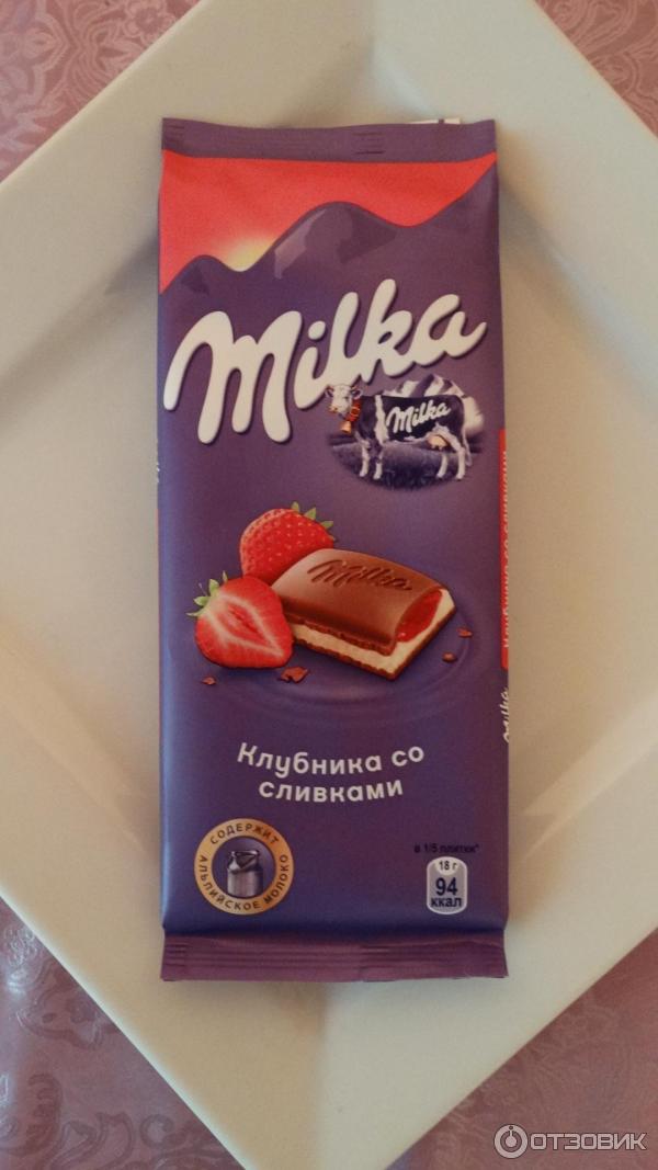 Шоколад молочный Milka с двухслойной начинкой фото