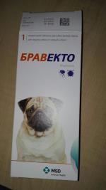 Таблетка для собак от блох и клещей MSD "Бравекто" фото