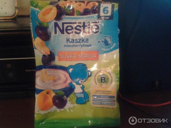 Молочная каша Nestle Рисовая со сливой и абрикосом фото