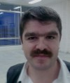 усатый