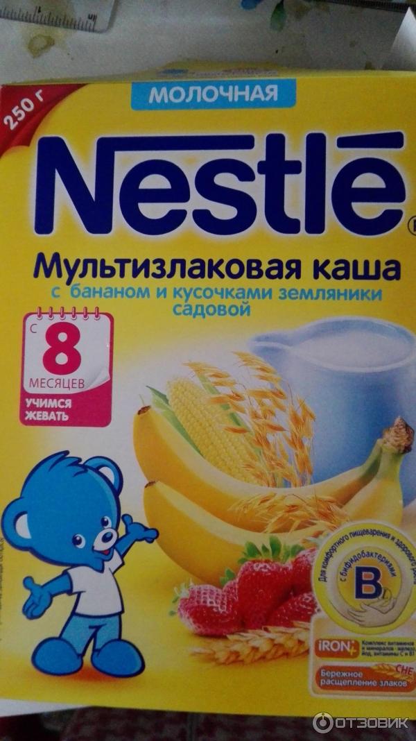 Мультизлаковая каша Nestle с бананом и кусочками земляники фото