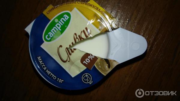 Сливки порционные Campina 10% фото