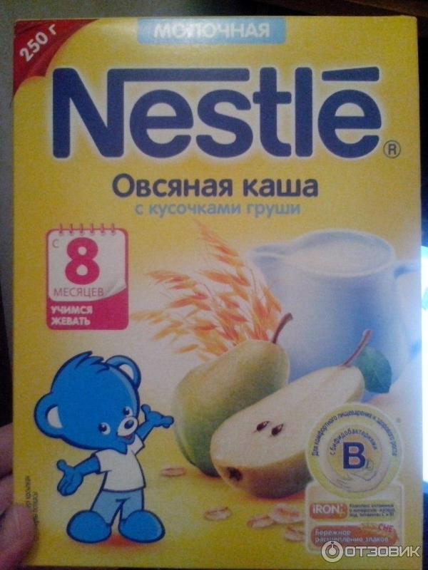 Детская молочная каша Nestle овсяная с кусочками груши фото