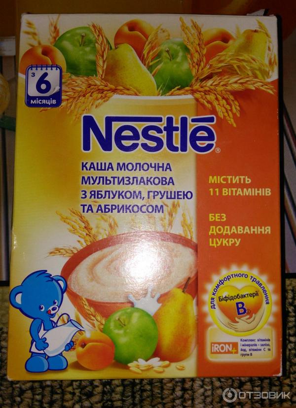 Каша Nestle молочная мультизлаковая с яблоком, грушей и абрикосом фото