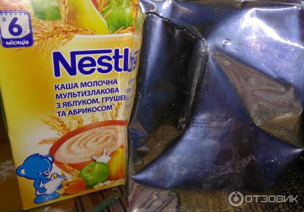 Каша Nestle молочная мультизлаковая с яблоком, грушей и абрикосом фото