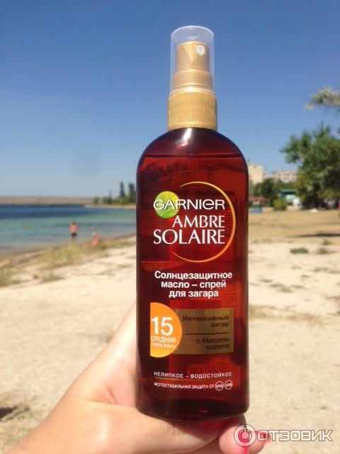 Масло для загара рейтинг. Ambre solaire spf15 спрей. Ambre solaire масло спрей для загара СПФ 15. Гарньер масло для загара 10 СПФ. Масло-спрей для загара Garnier Ambre solaire spf15.