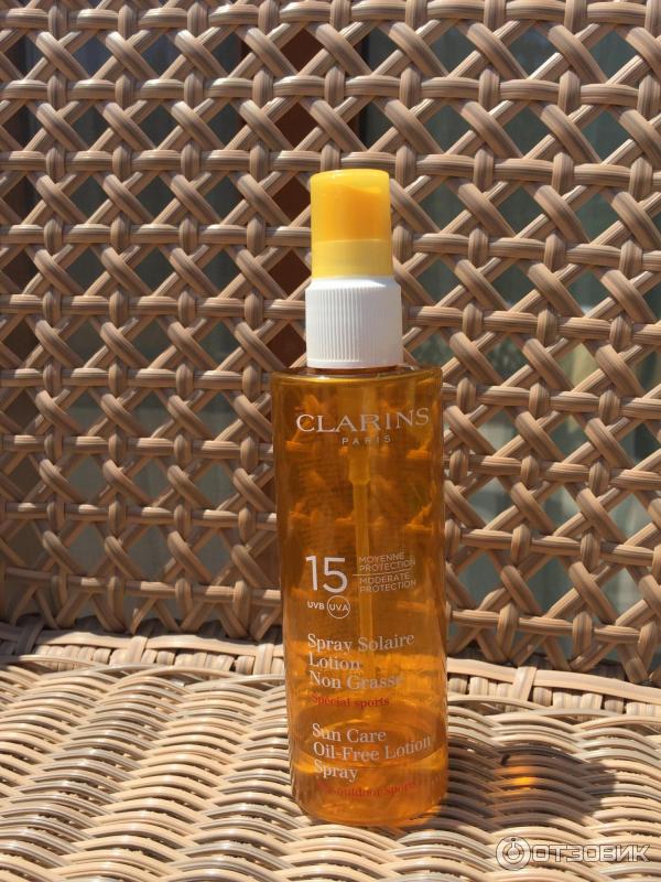 Солнцезащитный спрей для тела SPF 15 Clarins Sun Care Oil-Free lotion фото