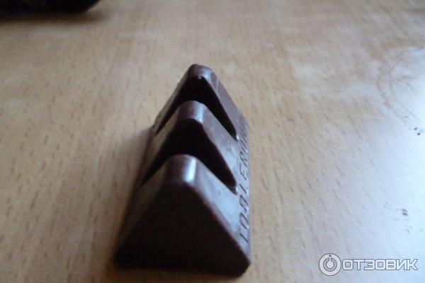 Шоколад Toblerone Swiss Dark Chocolate with Honey and Almond Nougat фото