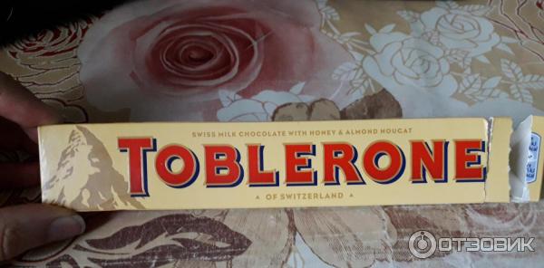 Швейцарский молочный шоколад Toblerone с медово-миндальной нугой фото