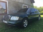 Автомобиль Mercedes-Benz W124 E220 седан фото