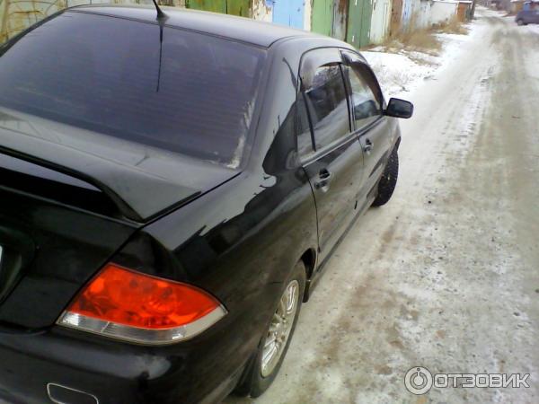 Автомобиль Mitsubishi Lancer IX седан фото