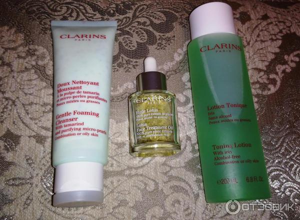 Нормализующее масло для комбинированной и жирной кожи Clarins Lotus Face Treatment Oil фото